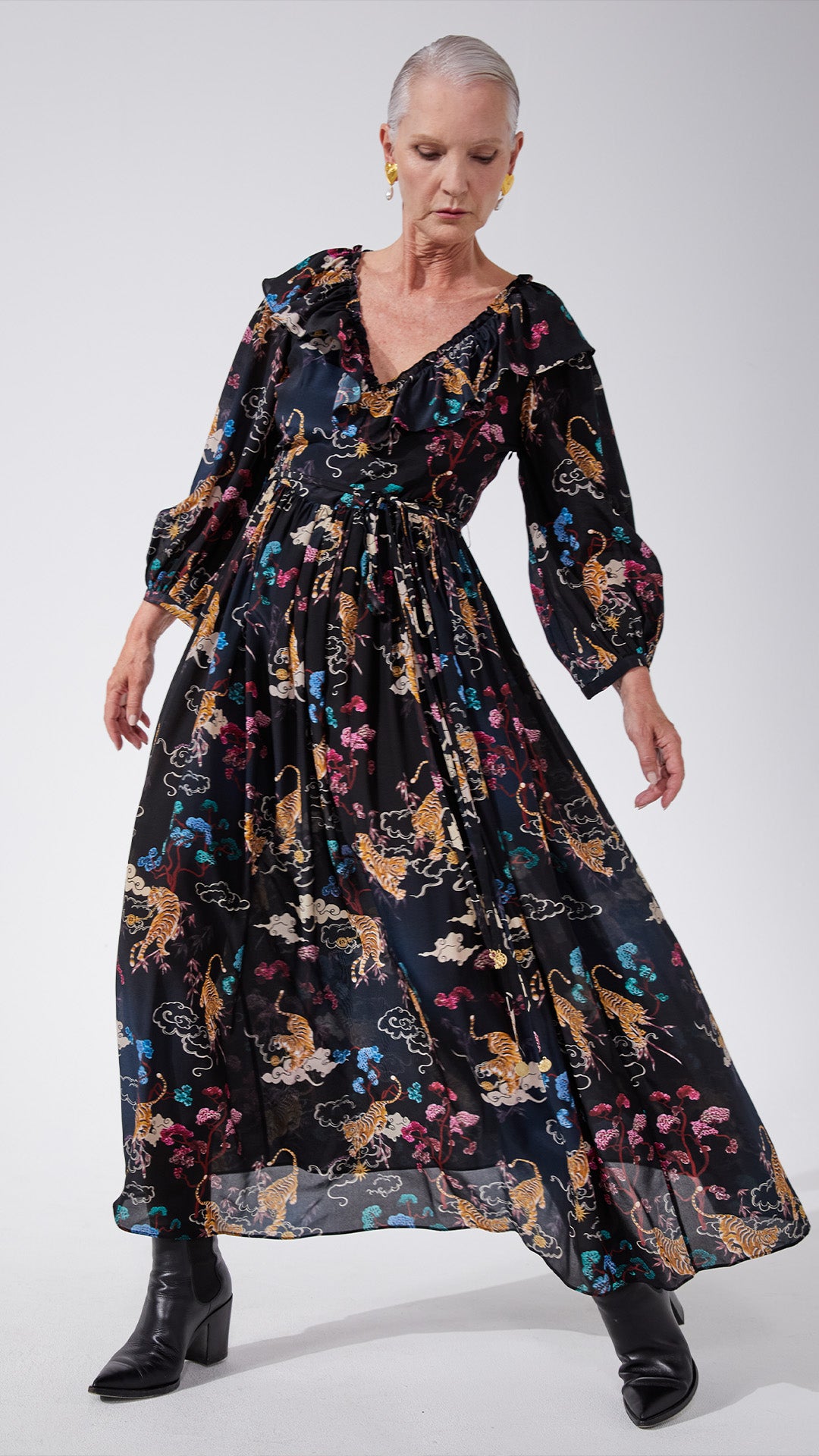 model wears hayley menzies denim dress in portobello road